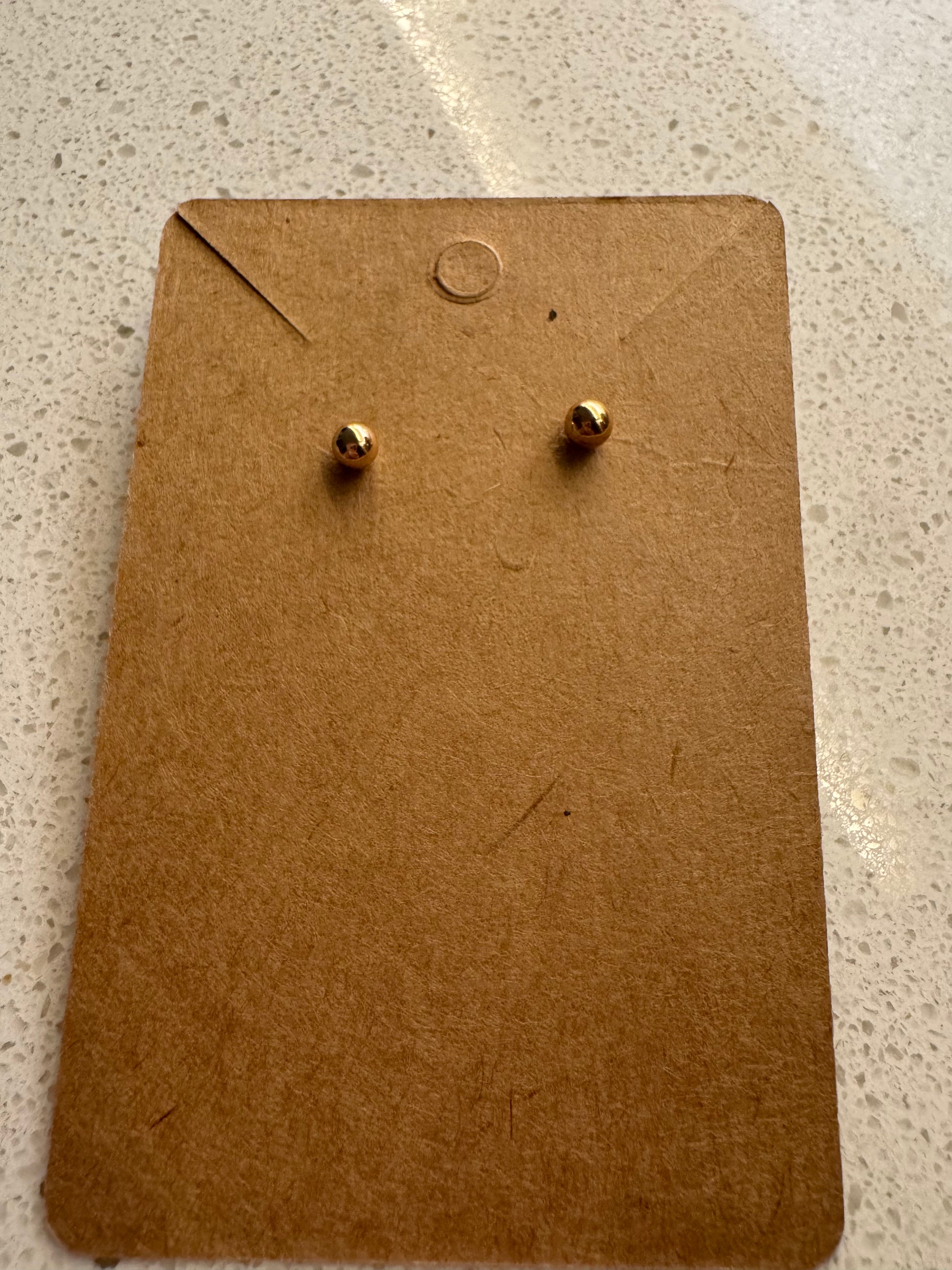 Gold pearl earring